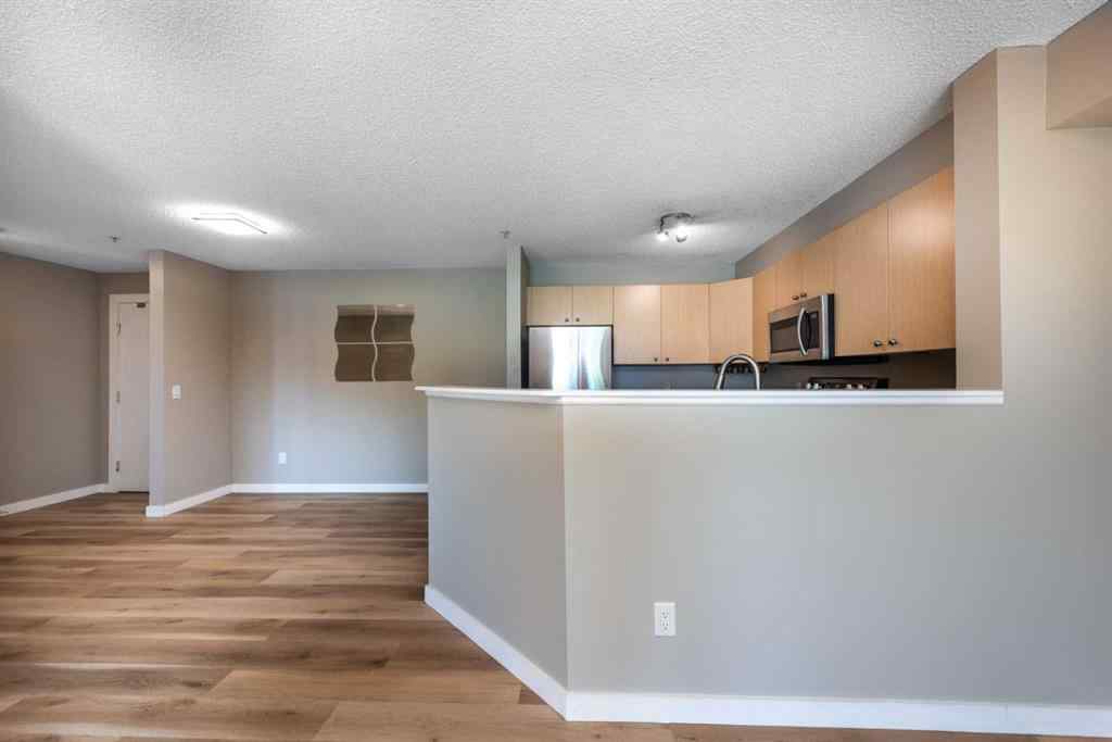 MLS® A2246733 - Unit #6204 304 Mackenzie Way SW in Downtown Airdrie, Residential