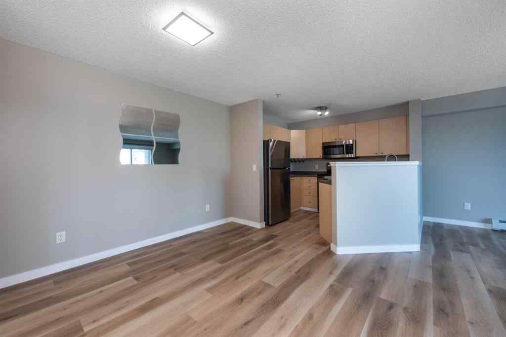 MLS® A2246733 - Unit #6204 304 Mackenzie Way SW in Downtown Airdrie, Residential