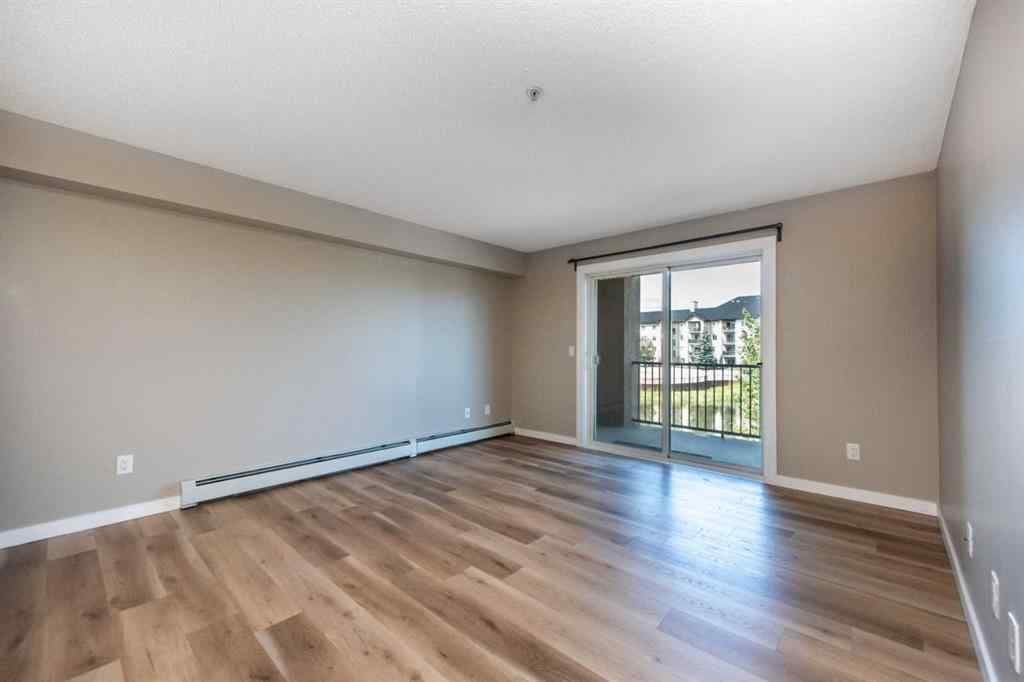 MLS® A2246733 - Unit #6204 304 Mackenzie Way SW in Downtown Airdrie, Residential