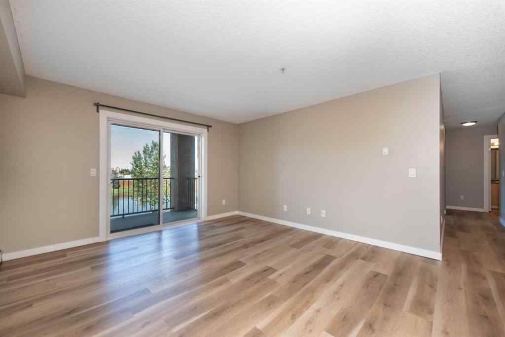 MLS® A2246733 - Unit #6204 304 Mackenzie Way SW in Downtown Airdrie, Residential