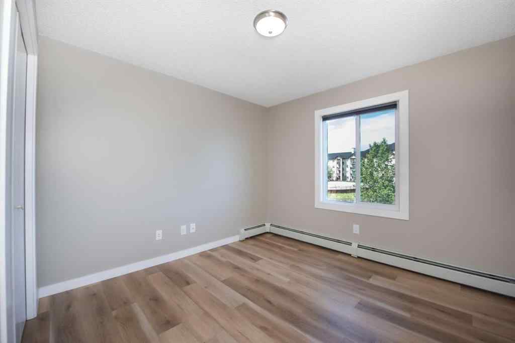 MLS® A2246733 - Unit #6204 304 Mackenzie Way SW in Downtown Airdrie, Residential