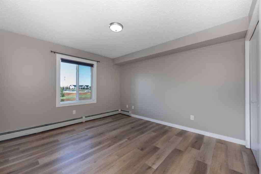 MLS® A2246733 - Unit #6204 304 Mackenzie Way SW in Downtown Airdrie, Residential
