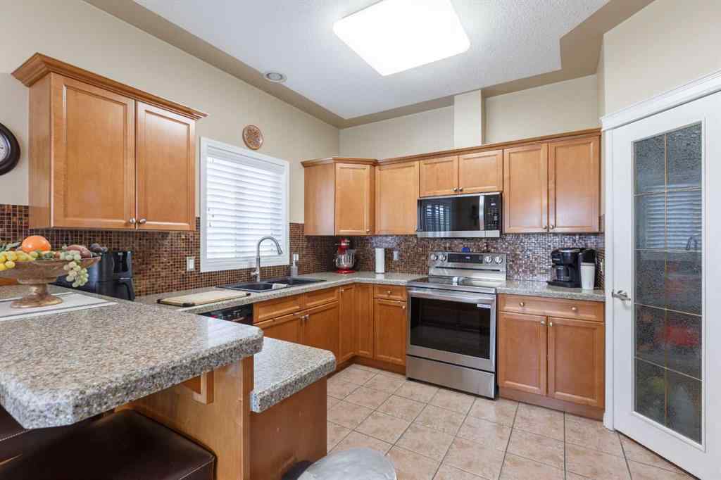 MLS® A2246771 - 136 Country Hills Gardens NW in Country Hills Calgary, Residential