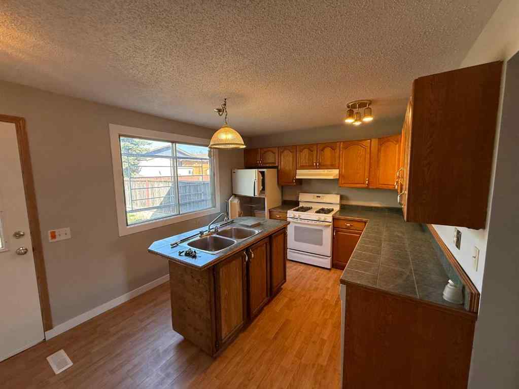 MLS® A2246772 - 74 Aberdare Way NE in Abbeydale Calgary, Residential