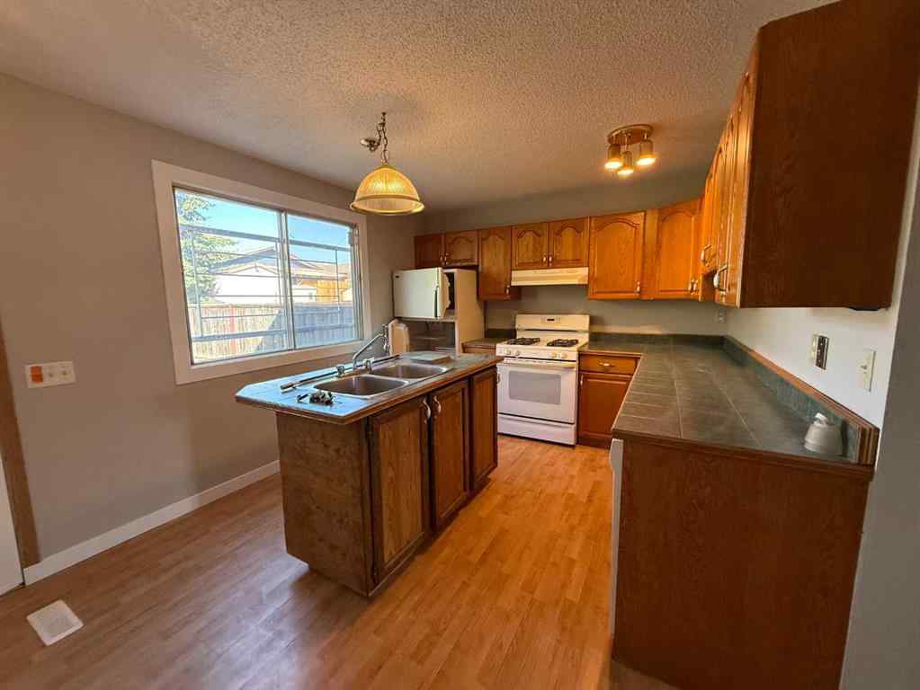 MLS® A2246772 - 74 Aberdare Way NE in Abbeydale Calgary, Residential