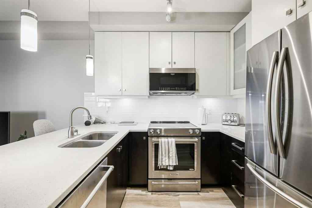MLS® A2246773 - Unit #109 1720 10 Street SW in Lower Mount Royal Calgary, Residential
