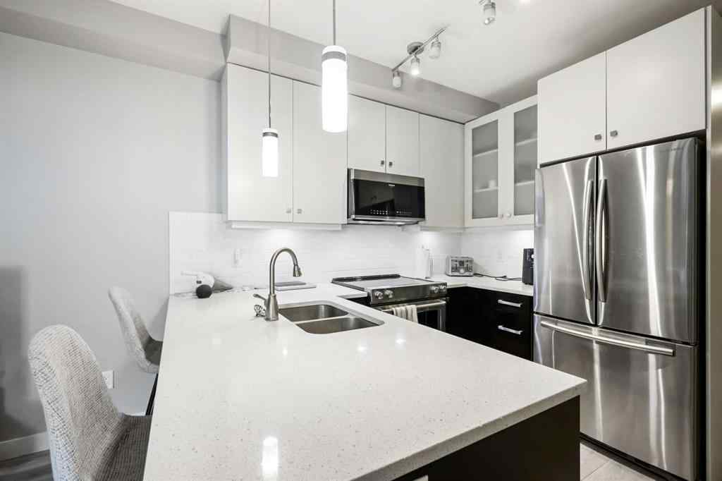 MLS® A2246773 - Unit #109 1720 10 Street SW in Lower Mount Royal Calgary, Residential