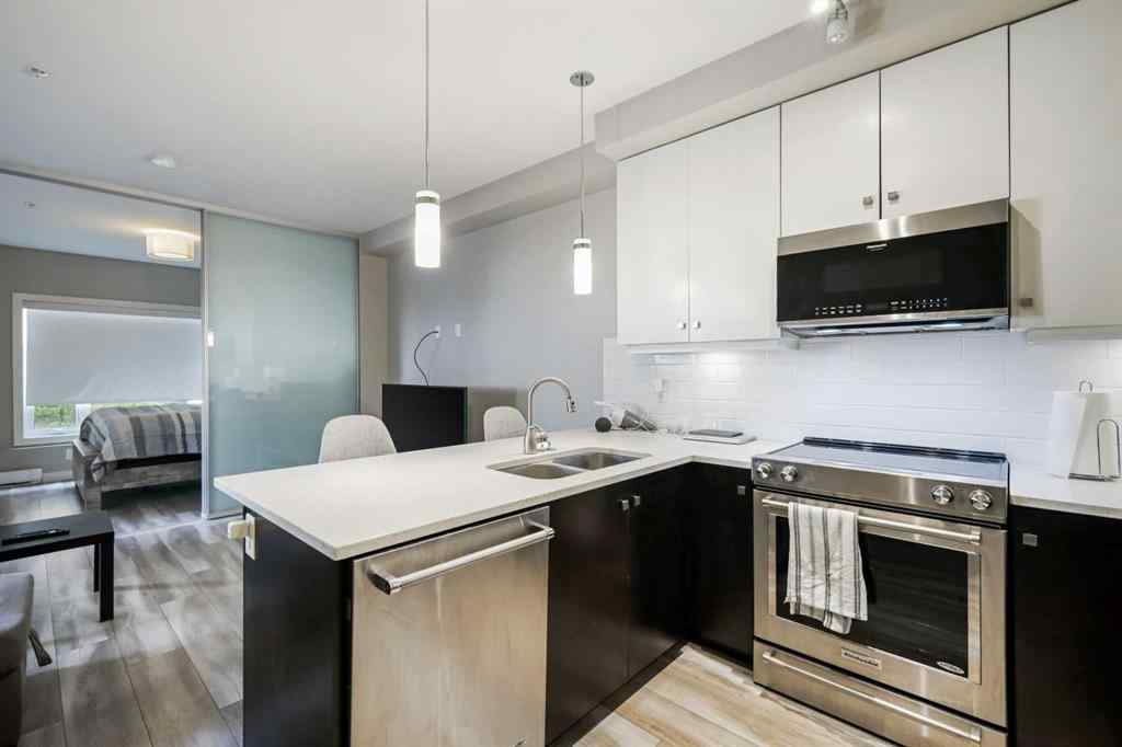 MLS® A2246773 - Unit #109 1720 10 Street SW in Lower Mount Royal Calgary, Residential