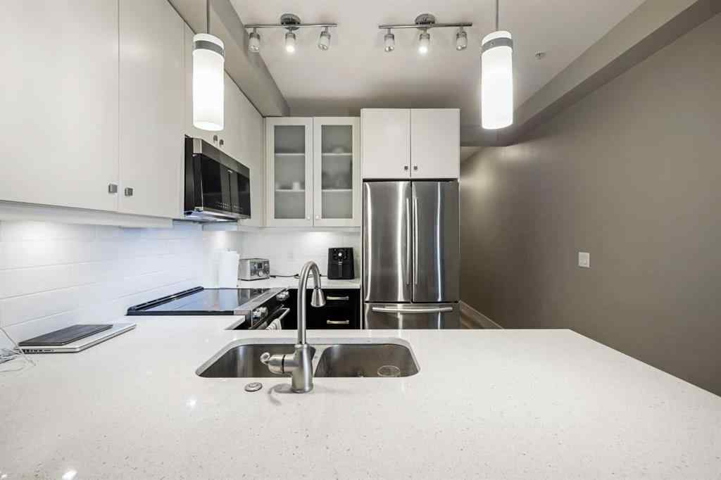MLS® A2246773 - Unit #109 1720 10 Street SW in Lower Mount Royal Calgary, Residential
