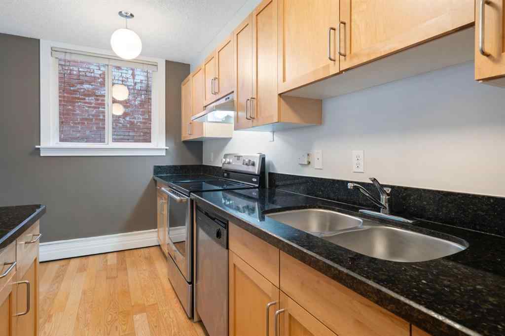 MLS® A2246861 - Unit #105 934 2 Avenue NW in Sunnyside Calgary, Residential