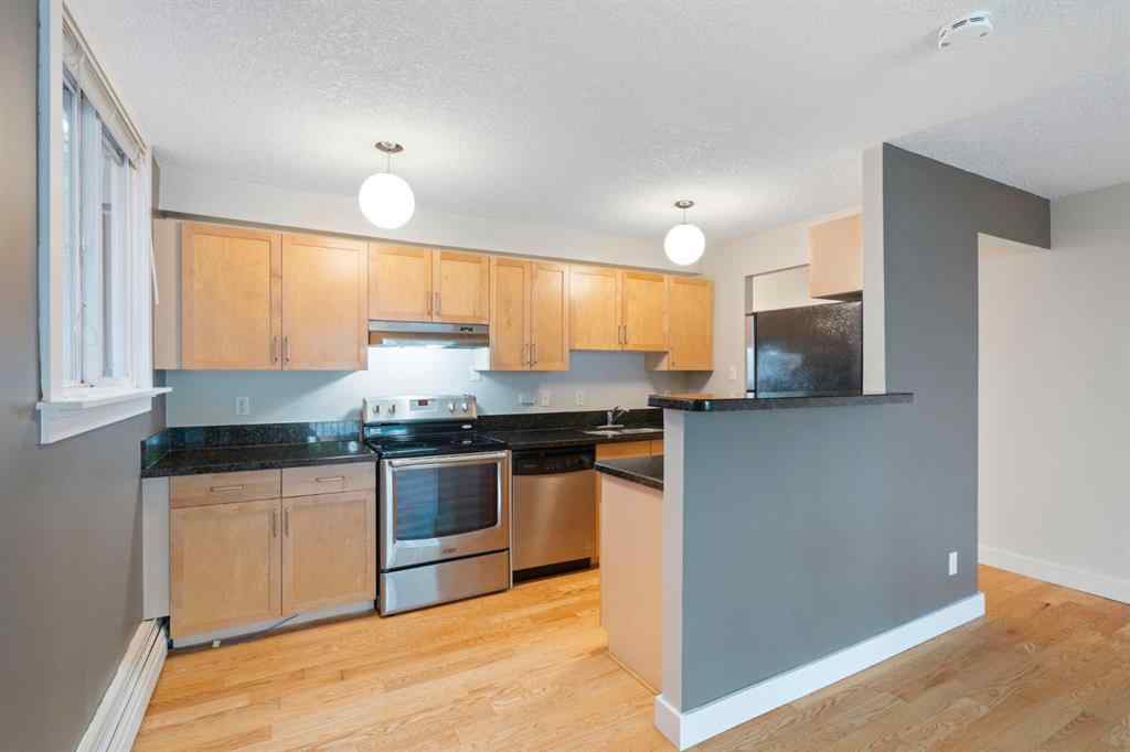 MLS® A2246861 - Unit #105 934 2 Avenue NW in Sunnyside Calgary, Residential