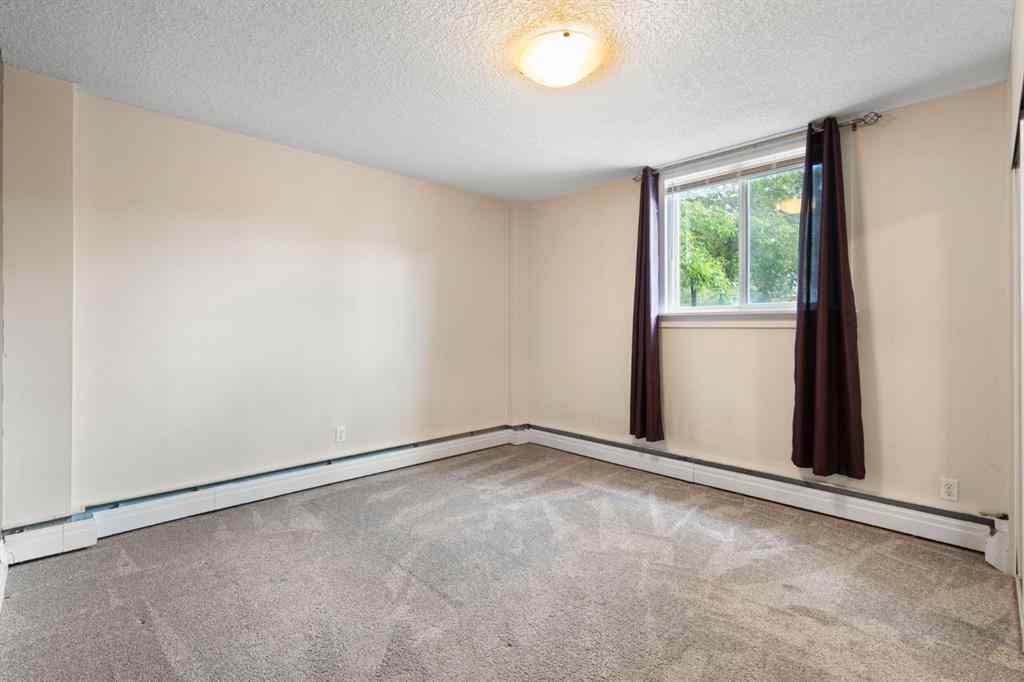 MLS® A2246861 - Unit #105 934 2 Avenue NW in Sunnyside Calgary, Residential