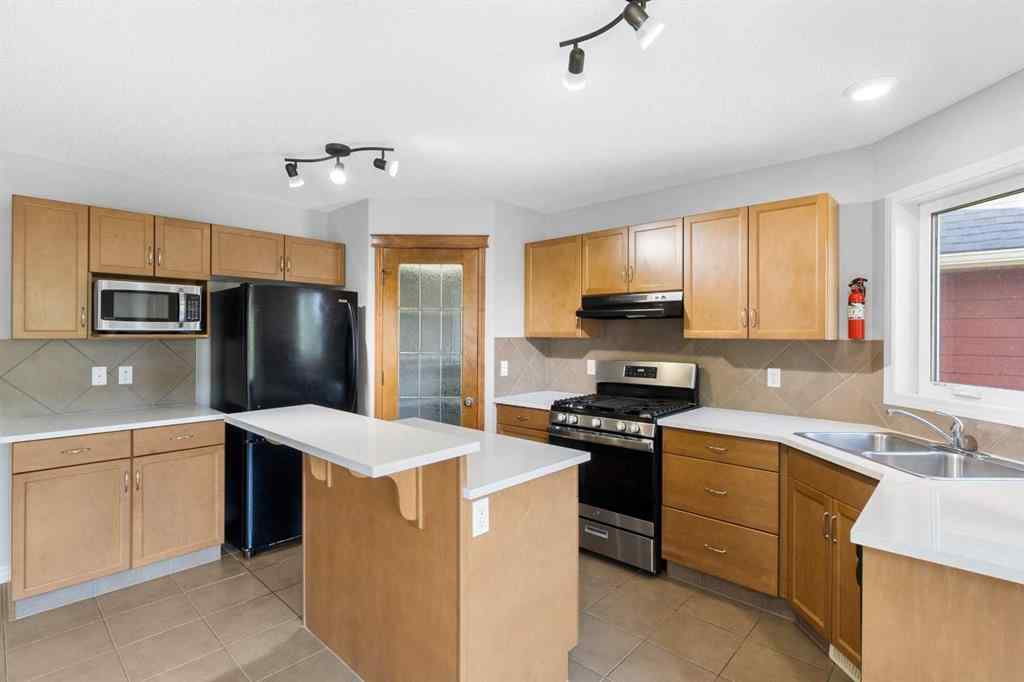 MLS® A2246915 - 928 Prairie Springs Drive SW in Prairie Springs Airdrie, Residential