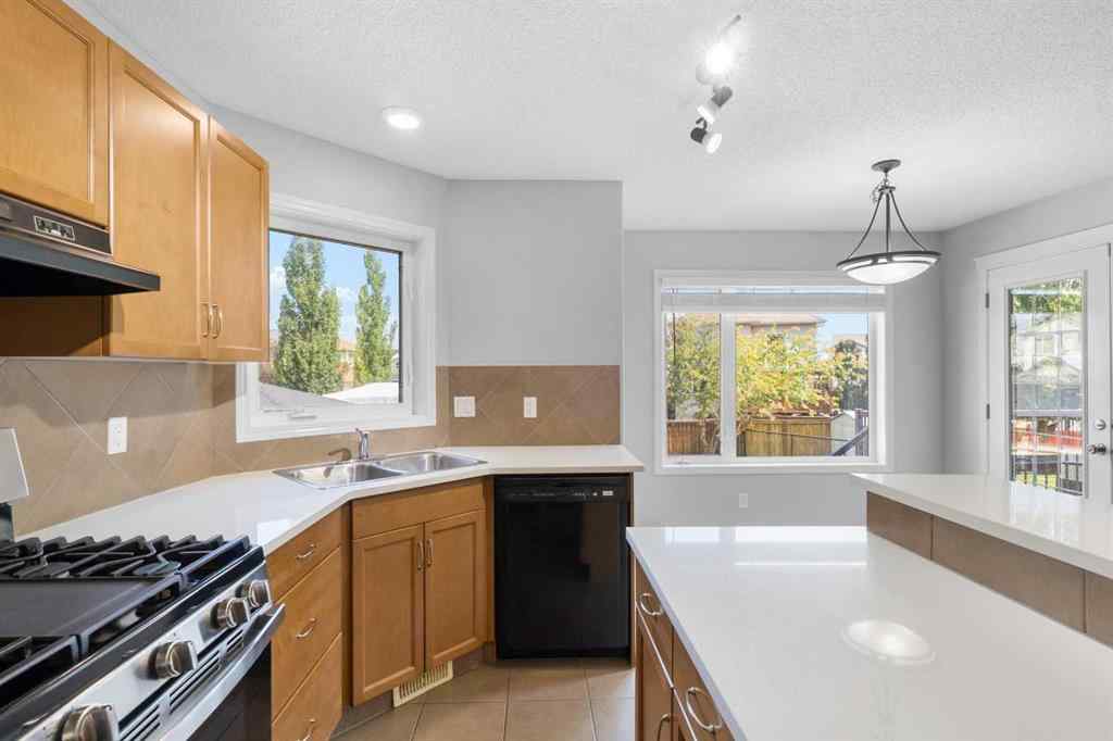 MLS® A2246915 - 928 Prairie Springs Drive SW in Prairie Springs Airdrie, Residential