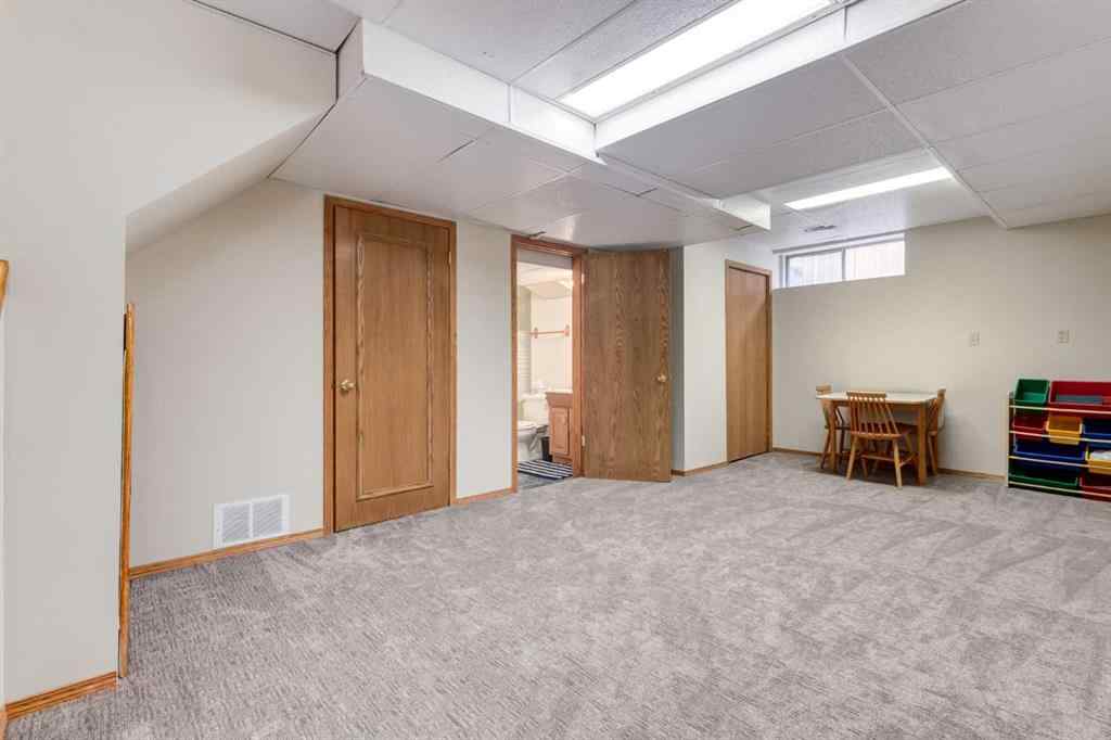 MLS® A2246918 - 39 Canterbury Court SW in Canyon Meadows Calgary, Residential