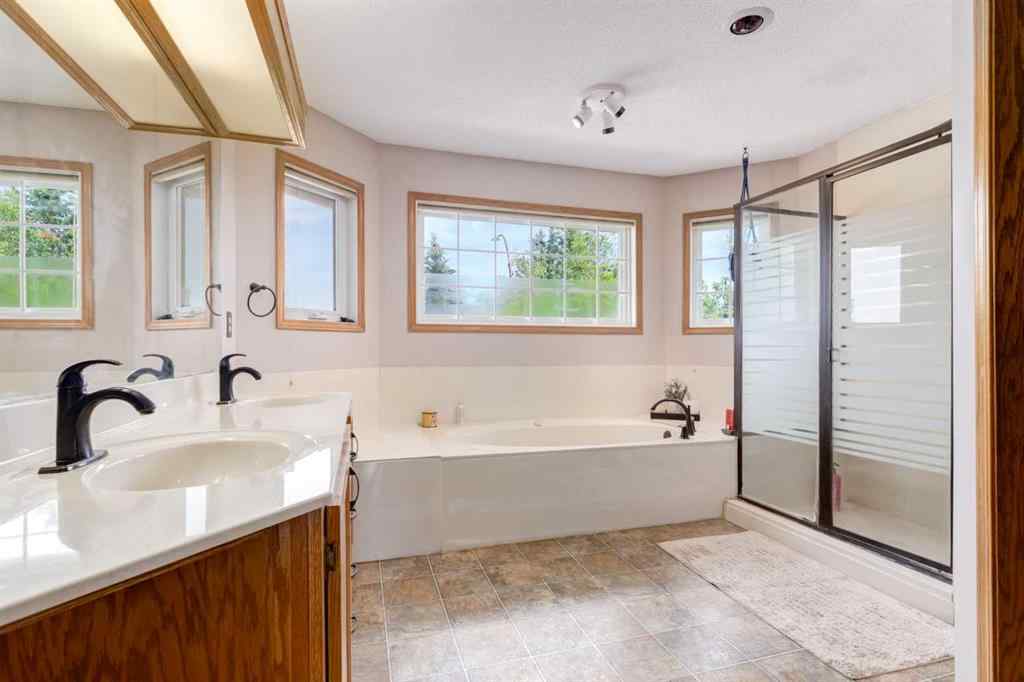 MLS® A2246918 - 39 Canterbury Court SW in Canyon Meadows Calgary, Residential