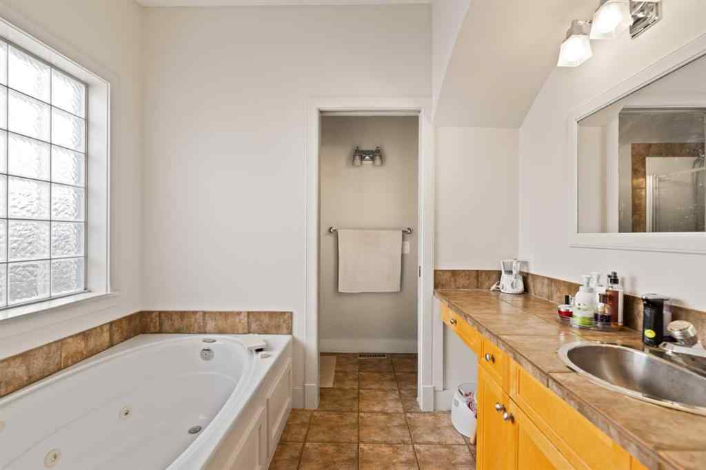 MLS® A2246927 - 250 Strathridge Place SW in Strathcona Park Calgary, Residential