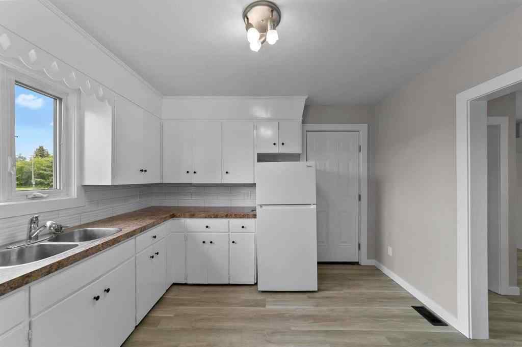 MLS® A2246935 - 201 Main Street  in Rosalind Rosalind, Residential