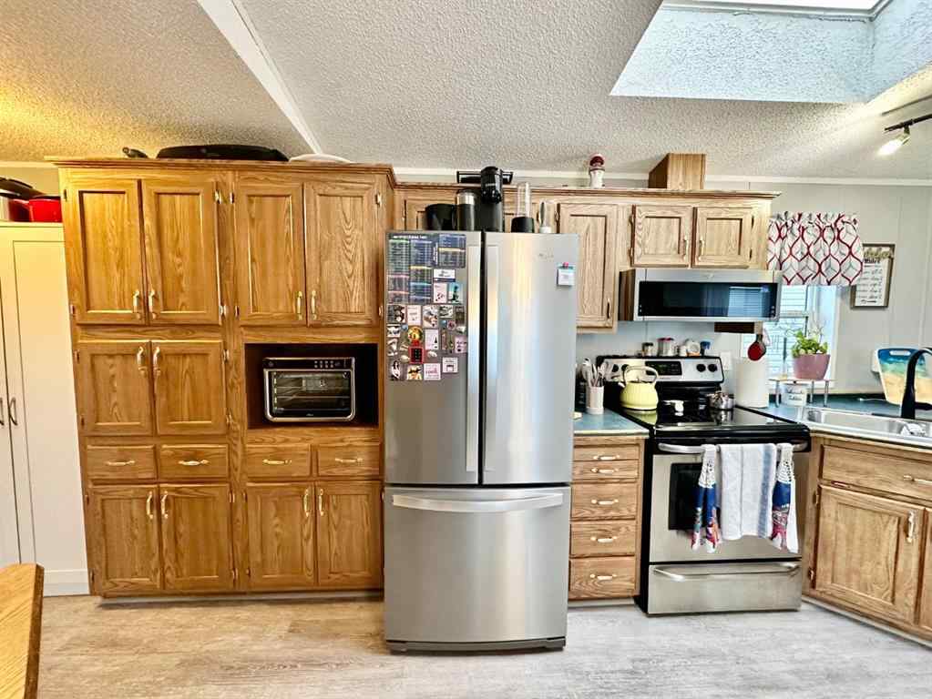 MLS® A2246936 - 43 Maple Drive  in Sunnylea Brooks, Mobile