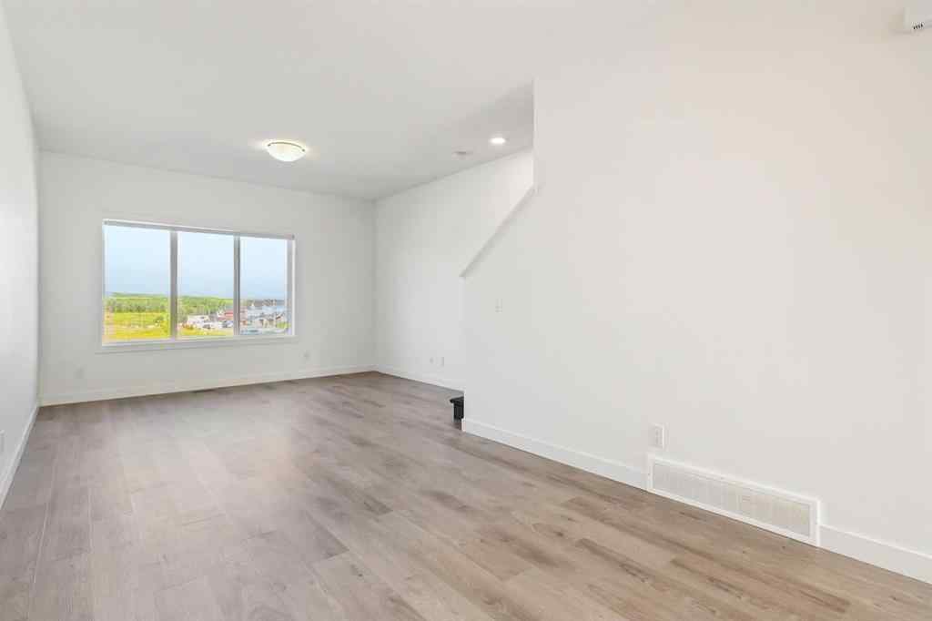 MLS® A2246937 - Unit #203 24 Rivercrest Drive  in Rivercrest Cochrane, Residential