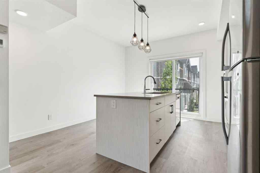MLS® A2246937 - Unit #203 24 Rivercrest Drive  in Rivercrest Cochrane, Residential