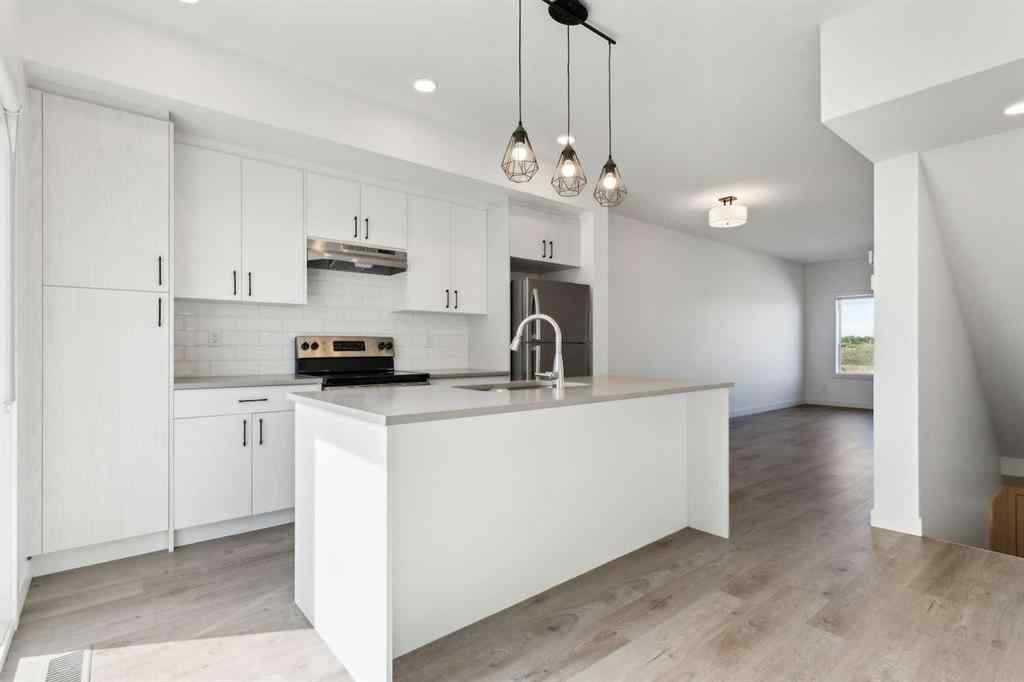 MLS® A2246937 - Unit #203 24 Rivercrest Drive  in Rivercrest Cochrane, Residential