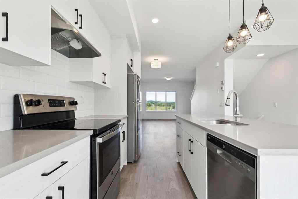 MLS® A2246937 - Unit #203 24 Rivercrest Drive  in Rivercrest Cochrane, Residential