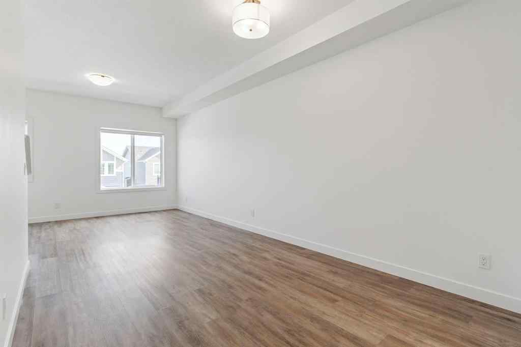 MLS® A2246948 - Unit #703 24 Rivercrest Drive  in Rivercrest Cochrane, Residential