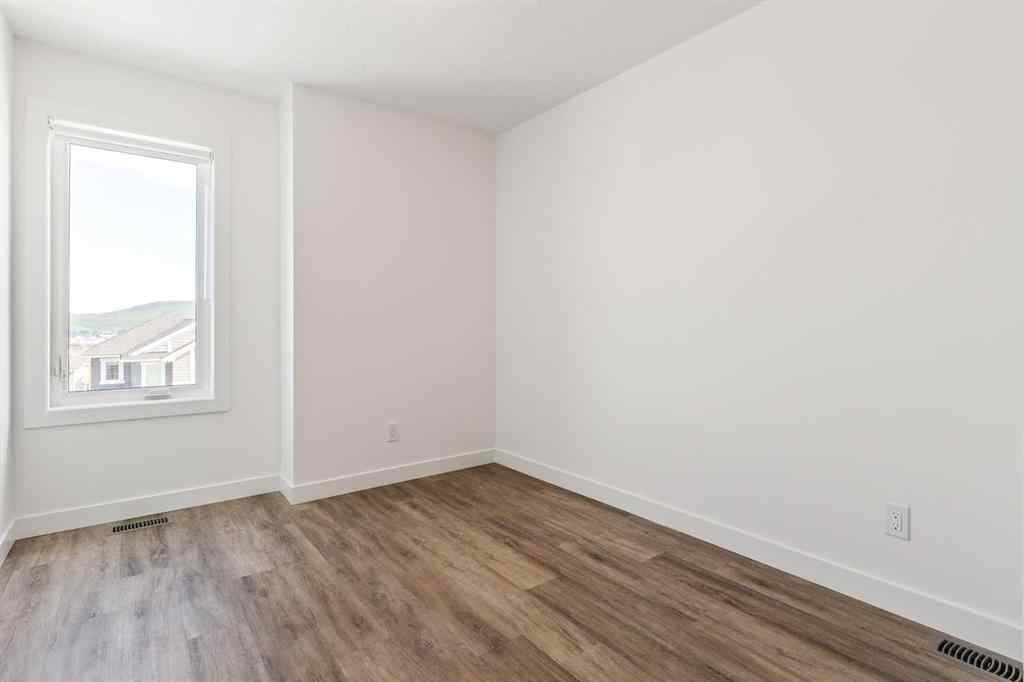 MLS® A2246948 - Unit #703 24 Rivercrest Drive  in Rivercrest Cochrane, Residential