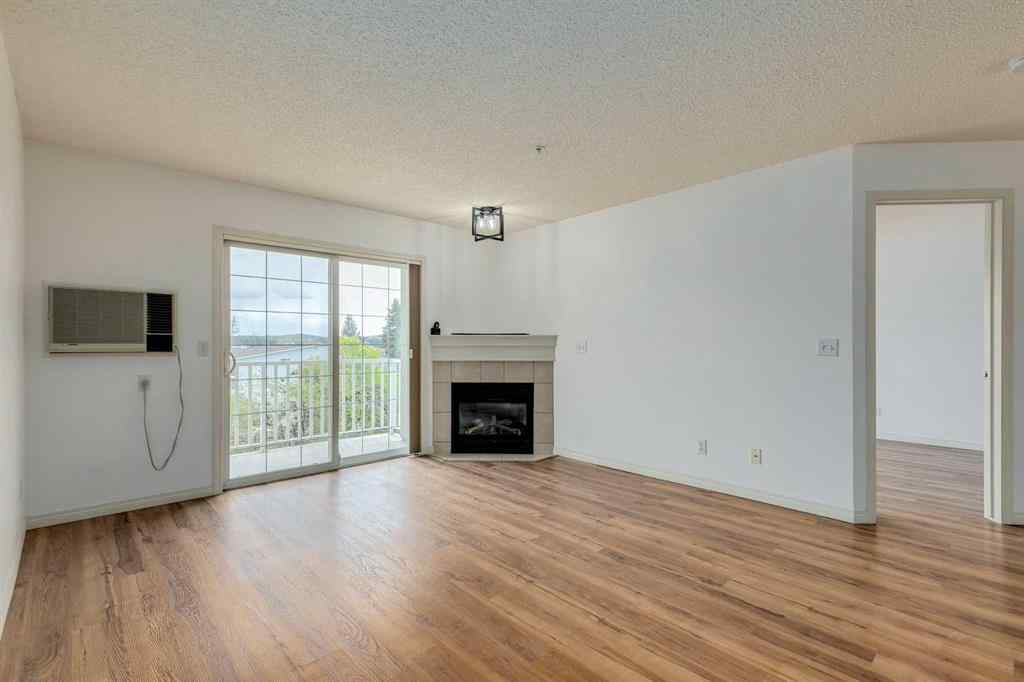 MLS® A2246972 - Unit #301 128 Centre Avenue  in Downtown Cochrane, Residential