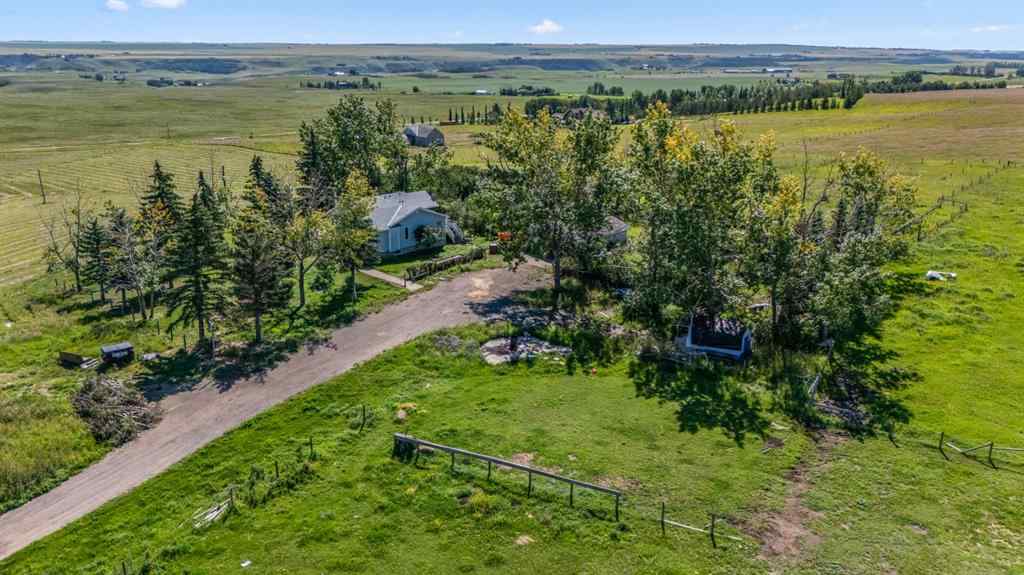 MLS® A2246977 - 290003 96 Street E in NONE De Winton, Residential