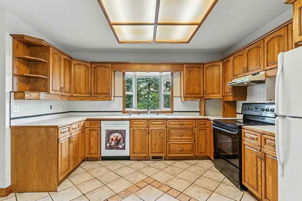 MLS® A2246977 - 290003 96 Street E in NONE De Winton, Residential