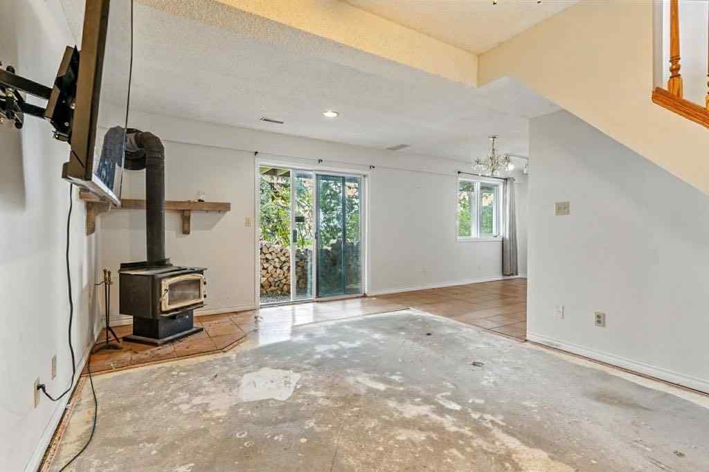 MLS® A2246977 - 290003 96 Street E in NONE De Winton, Residential