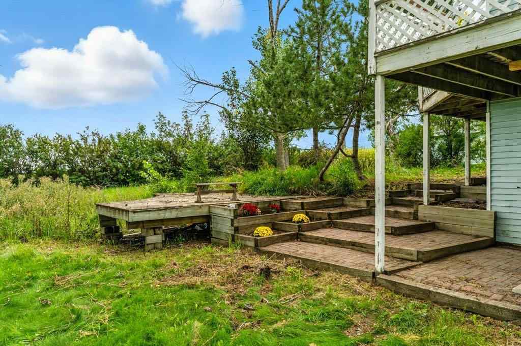 MLS® A2246977 - 290003 96 Street E in NONE De Winton, Residential