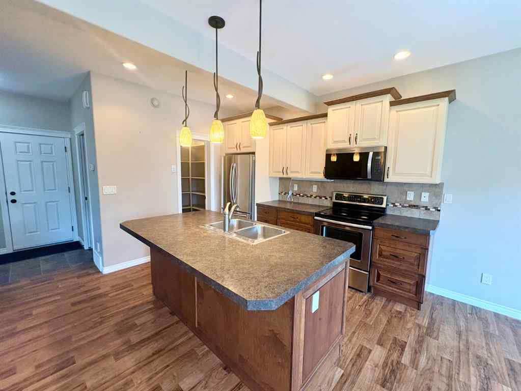 MLS® A2246994 - 238 Viscount Drive SE in Vanier Woods Red Deer, Residential