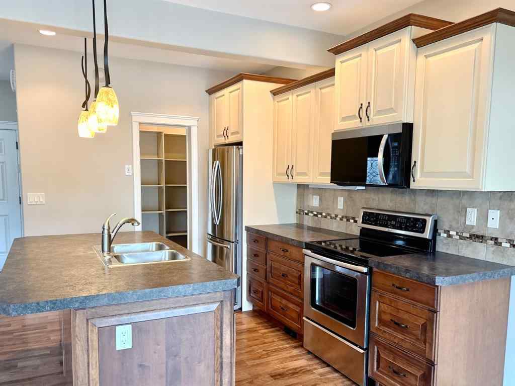 MLS® A2246994 - 238 Viscount Drive SE in Vanier Woods Red Deer, Residential