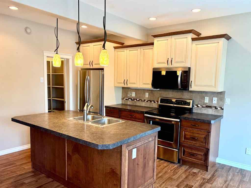 MLS® A2246994 - 238 Viscount Drive SE in Vanier Woods Red Deer, Residential