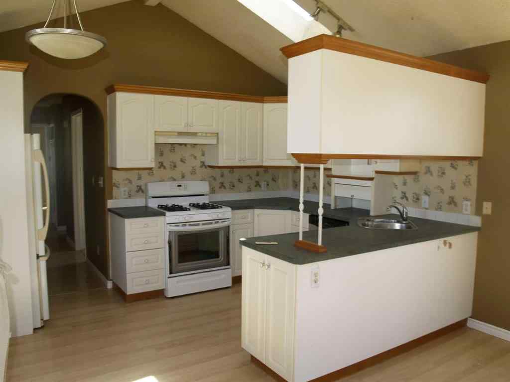 MLS® A2247014 - 60 Parkland Acres  in Parkland Trailer Park Lacombe, Mobile