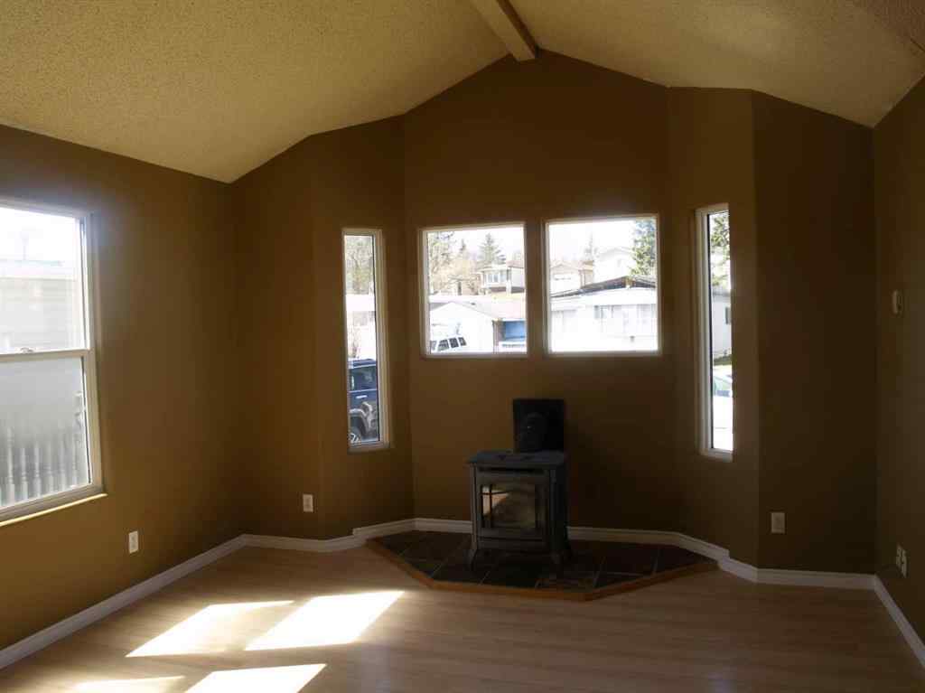 MLS® A2247014 - 60 Parkland Acres  in Parkland Trailer Park Lacombe, Mobile