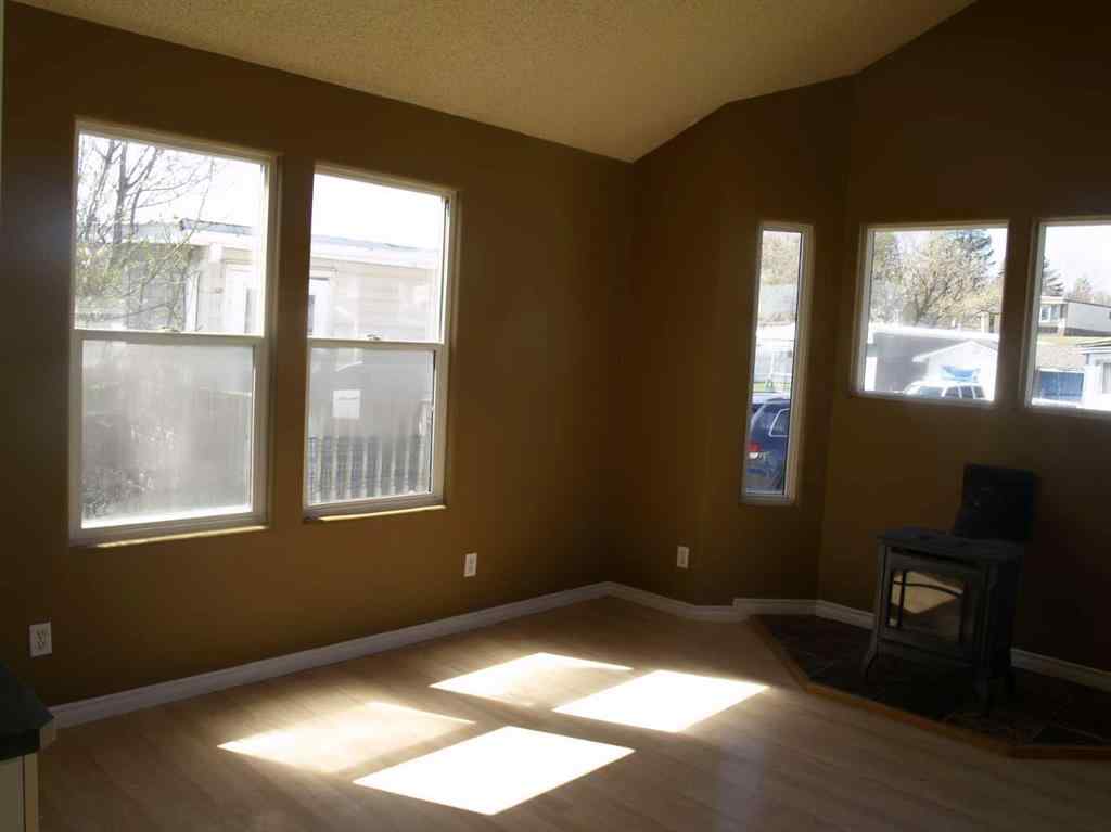 MLS® A2247014 - 60 Parkland Acres  in Parkland Trailer Park Lacombe, Mobile