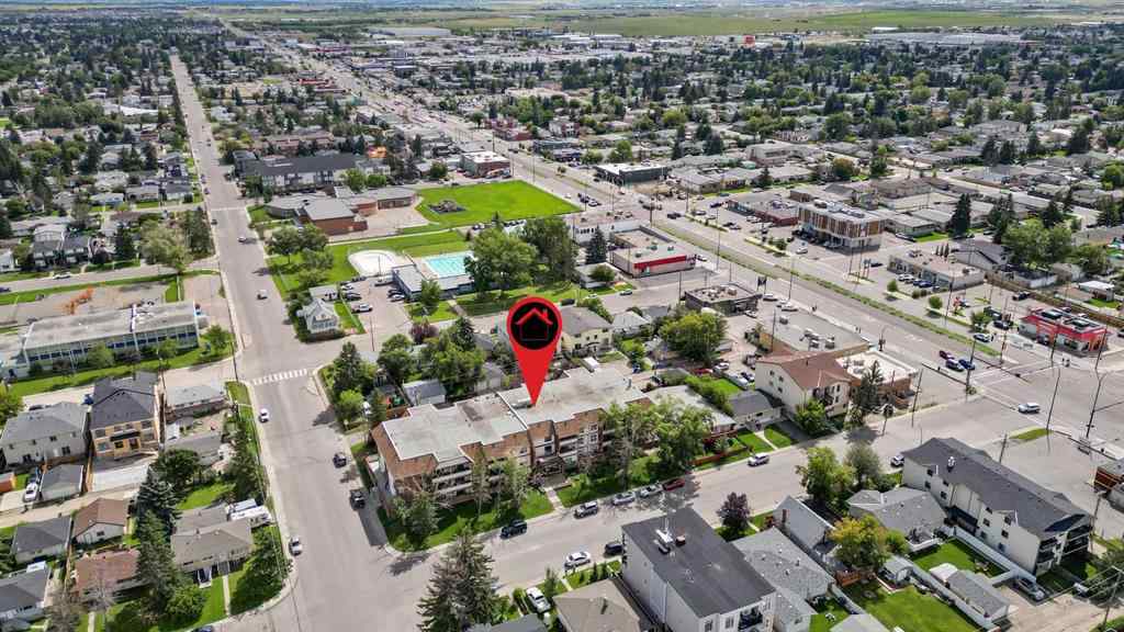 MLS® A2247021 - Unit #103 1712 38 Street SE in Forest Lawn Calgary, Residential