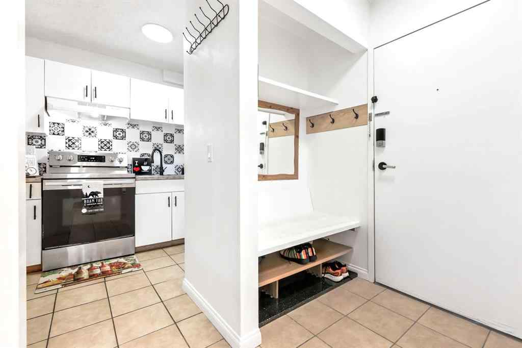 MLS® A2247021 - Unit #103 1712 38 Street SE in Forest Lawn Calgary, Residential