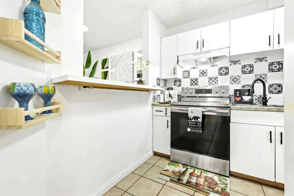 MLS® A2247021 - Unit #103 1712 38 Street SE in Forest Lawn Calgary, Residential