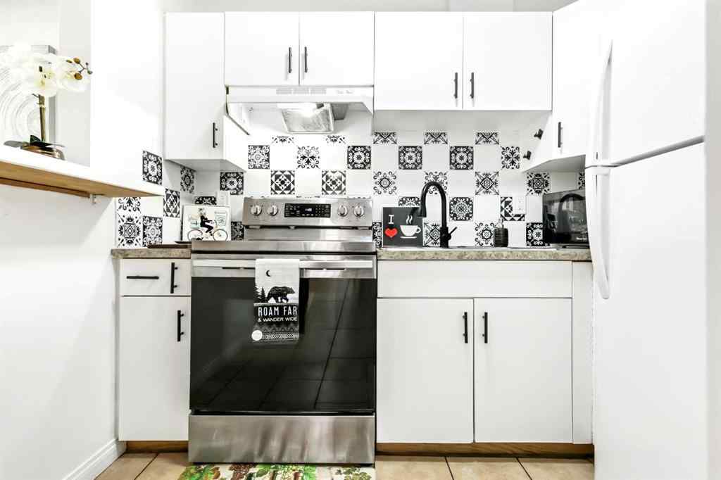 MLS® A2247021 - Unit #103 1712 38 Street SE in Forest Lawn Calgary, Residential