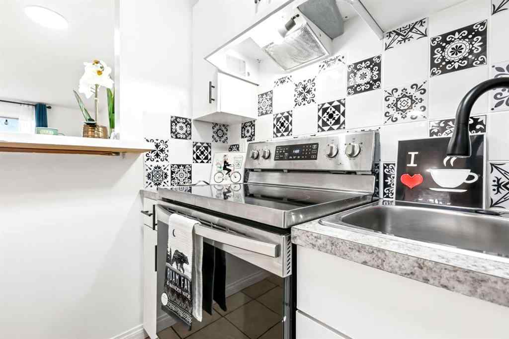 MLS® A2247021 - Unit #103 1712 38 Street SE in Forest Lawn Calgary, Residential