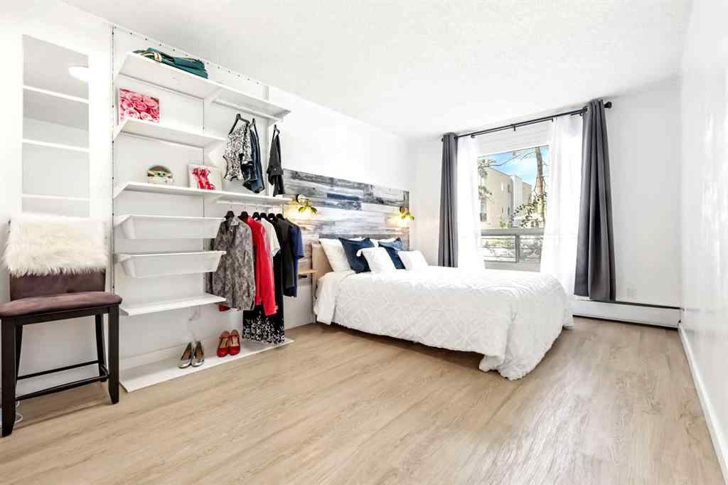 MLS® A2247021 - Unit #103 1712 38 Street SE in Forest Lawn Calgary, Residential