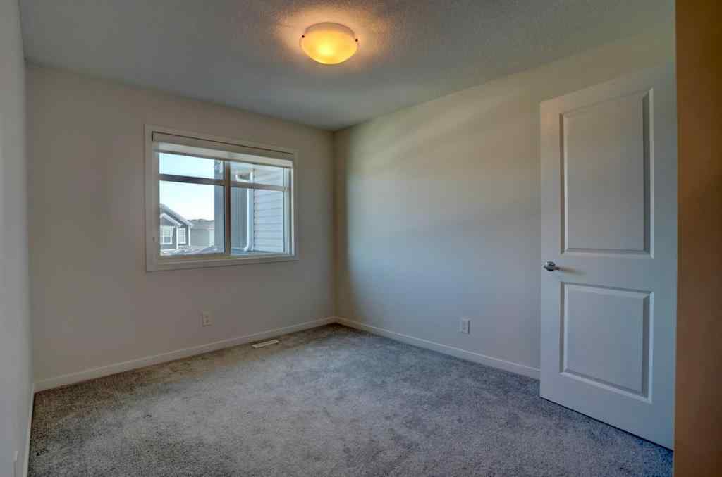 MLS® A2247025 - 876 Seton Circle SE in Seton Calgary, Residential