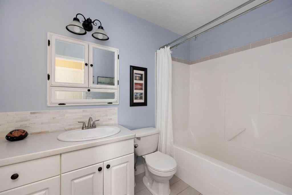 MLS® A2247035 - 115 Community Lane  in Saprae Creek Estates Saprae Creek, Residential