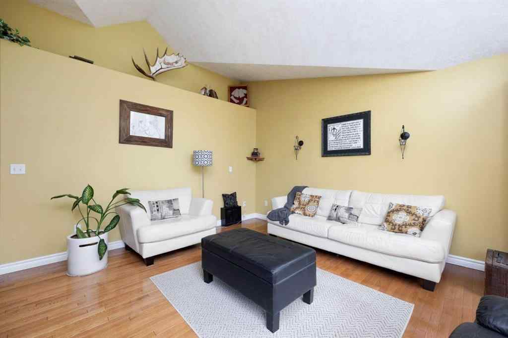 MLS® A2247035 - 115 Community Lane  in Saprae Creek Estates Saprae Creek, Residential