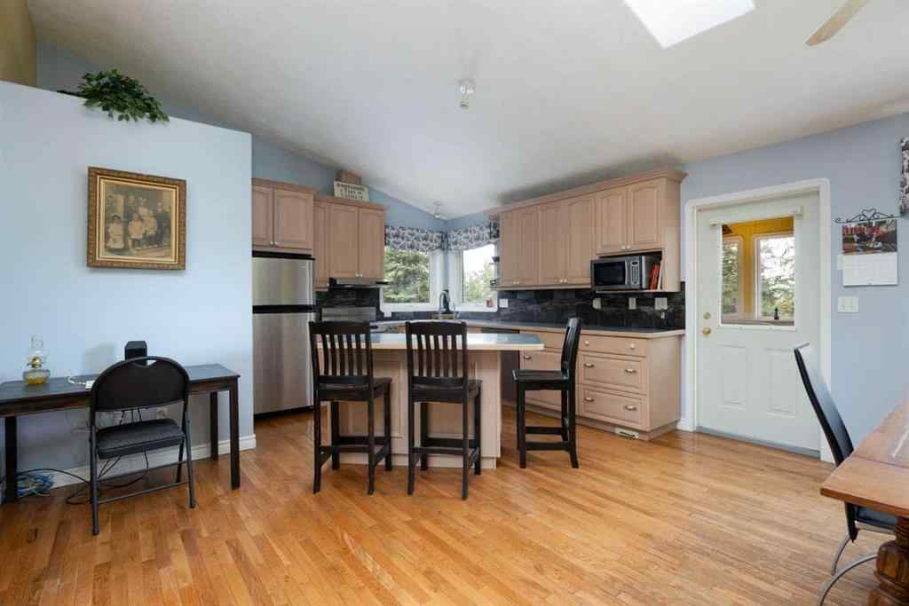 MLS® A2247035 - 115 Community Lane  in Saprae Creek Estates Saprae Creek, Residential